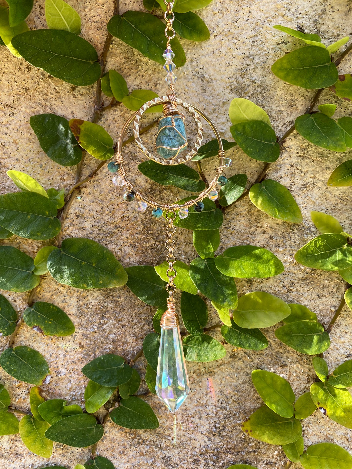 Rough Fuchsite sun catcher with large crystal point