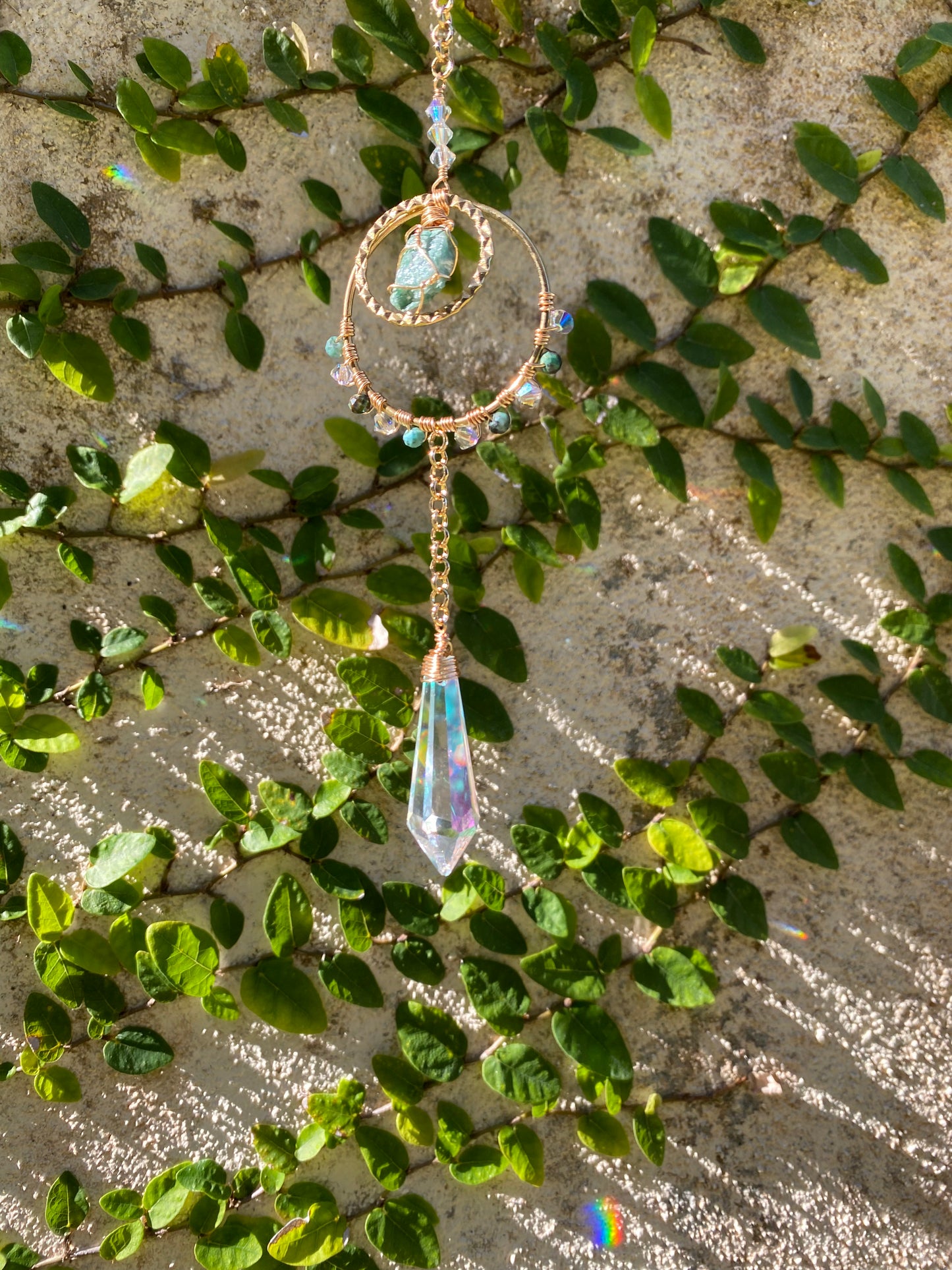Rough Fuchsite sun catcher with large crystal point